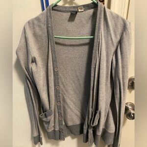 Gray and White striped cardigan with two pockets. Size small mens